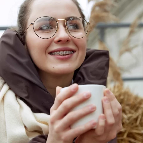 Women enjoying winter with braces.