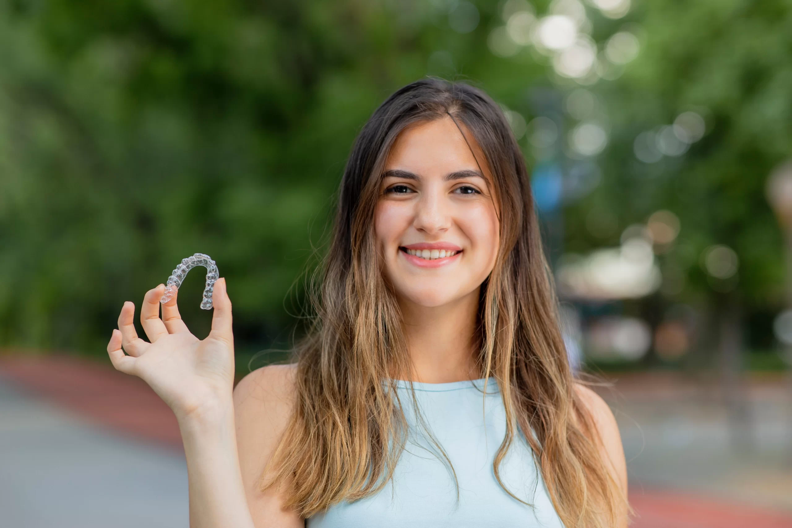 Invisalign Teen clear aligners for discreet orthodontic treatment.